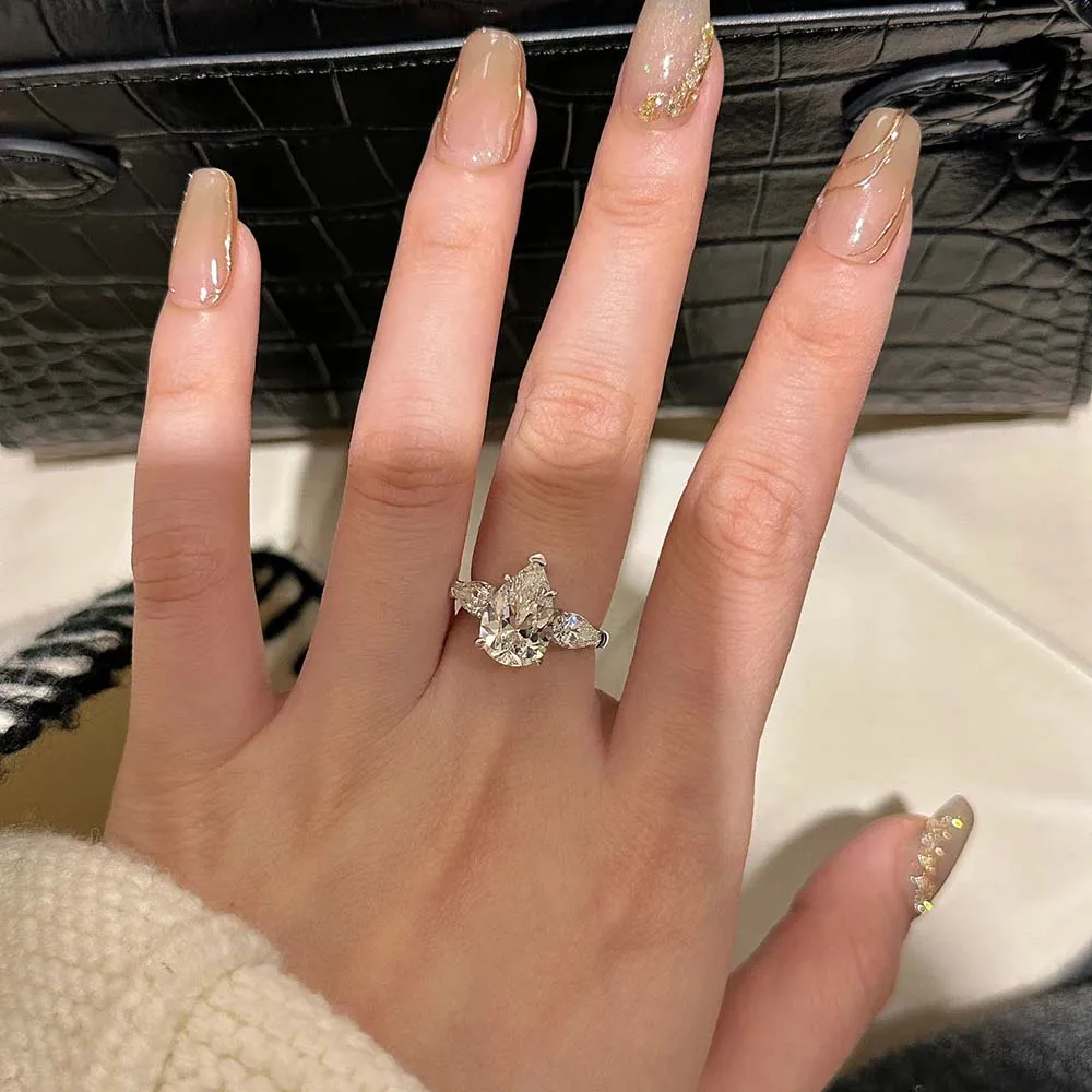 1-5CT Pear Cut Miossanite Ring Certified 925 Sterling Silver Plated 18K D VVS1 Lab Diamond Wedding Engagement Band for Women 1-5CT Pear Cut Miossanite Ring Certified 925 Sterling Silver Plated 18K D VVS1 Lab Diamond Wedding Engagement Band for Women
