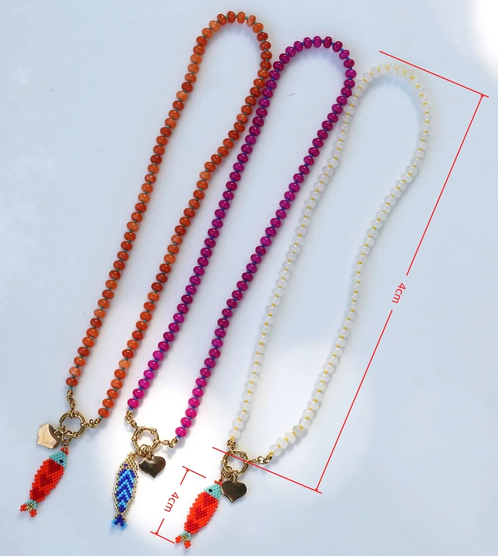 The latest Bohemian resort style jewelry colorful hand-woven fish pendant necklace with stainless steel accessories The latest Bohemian resort style jewelry colorful hand-woven fish pendant necklace with stainless steel accessories